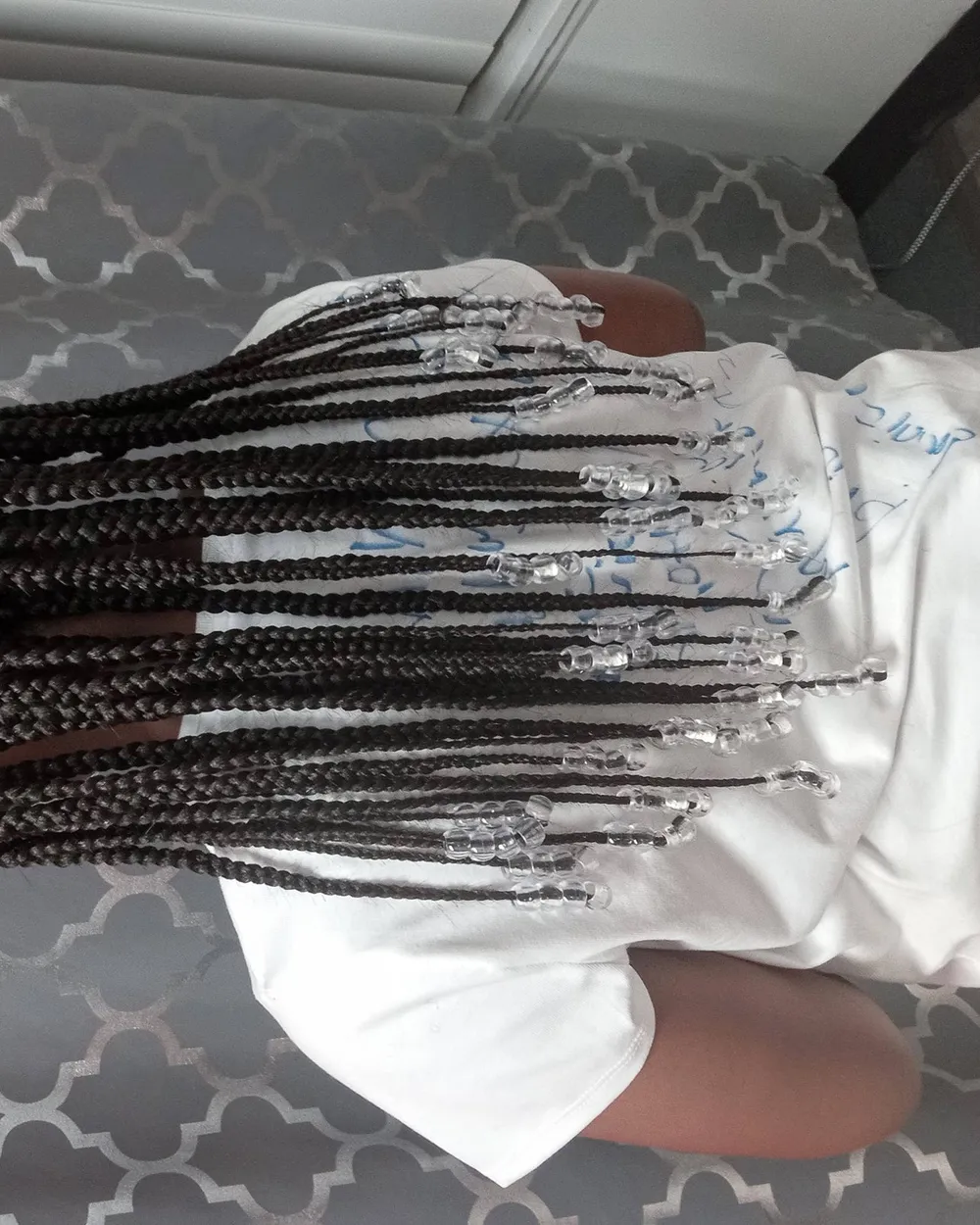 Finished box braids styled at Queenreal's Beauty Stop